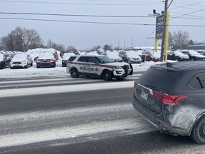 Police cruiser involved in two car collision on Lakeshore Drive.