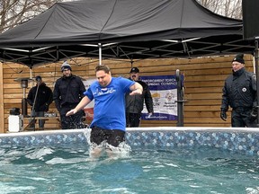 Tod Kane, 50, a local Special Olympian curler, dedicated his participation in the Polar Plunge that benefits Special Olympics, to the late retired Chatham-Kent police officer Mike Currie, who was his coach.  PHOTO Ellwood Shreve/Chatham Daily News