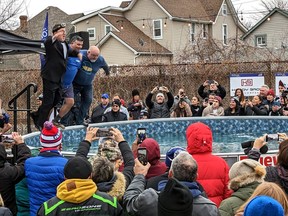 Chatham-Kent Mayor Darrin Canniff, left, Chatham WINMAR owner Dave Constancio, middle, and Sons of Kent partner Tim Copeland kickoff of the Polar Plunge to benefit Special Olympics by taking the first icy-cold plunge.  PHOTO handout
