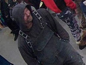 Grande Prairie police are looking for this man who pulled a fire alarm at a children's literacy reading Jan. 24.