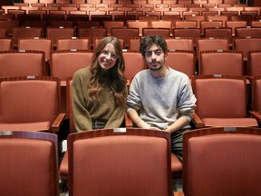 Madeline Ritter and Saman Saeidi, co-directors for this year's TEDxQueensU, sit in the seats of the Grand Theatre in Kingston on Saturday, Jan. 21, 2023. The theatre will host this year's TEDx event on Feb. 5 and 6.