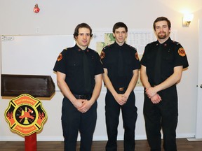 At a Mayerthorpe Fire Department promotion ceremony last Monday, (l-r) Blayne Van Kleek was promoted to lieutenant, and Ben Lloyd and A.J. Penner were promoted from recruits to firefighters.