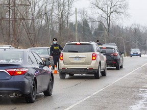 Elgin OPP conduct a mid afternoon RIDE (Reduce Impaired Driving Everywhere) program  on Sunset Drive north of. St. Thomas on Jan. 3, 2021.  Mike Hensen/Postmedia