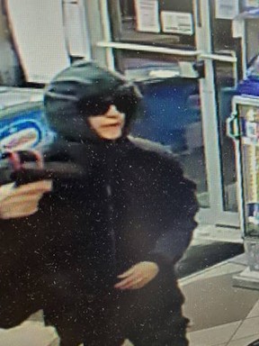 Sarnia police released this surveillance photo of a suspect sought in a gas bar robbery.