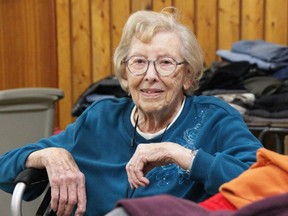 Fay Pole was one of the Fairwinds Lodge residents at Community of Christ Church in Sarnia Saturday looking through piles of clothing, and other items donated by the community, to help retirement home residents displaced by a recent fire.  (Tyler Kula/ The Observer)