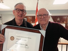 Mike Frederikcs (left), president and CEO of Annex Business Media, is presented with the Paul Harris Fellow award by Wally Anderson at a December meeting of the Rotary Club of Simcoe. CONTRIBUTED