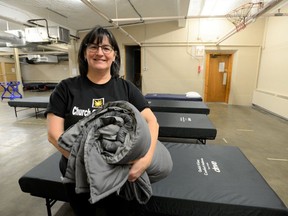 Virginia Lucas, director of Church Out Serving, inside the warming center the charity has set up in the basement of a downtown Simcoe church, with space for 20 people to spend the night.
