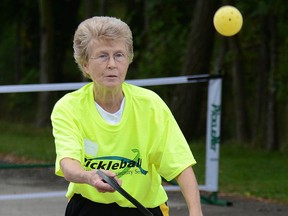 Dorothy Miskelly warms up for a pickleball tournament, hosted by Tillsonburg's Stonebridge Community Services during the 2013 Bayfest in Port Rowan.  Thirty-two players entered the all-day pickleball tournament.  photo file