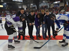 From left to right, Owen Sound District team captain Cole Gowan, former NHLers Anthony Stewart and Andrew Ference, Sue Hopkins Woods, Theresa Boley Trevor Chaisson and St. Mary's Mustangs captain Nate Oniszeczko take part in the ceremonial face-off before the East vs. West High School Boys Challenge Cup between the Owen Sound District Wolves and St. Mary's Mustangs Friday afternoon at the Harry Lumley Bayshore Community Centre. Rob Gowan/The Sun Times