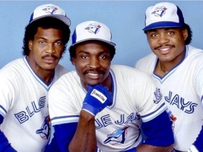 Former Toronto Blue Jays' star Jesse Barfield, right, will be inducted into the Canadian Baseball Hall of Fame in June.  Barfield formed one-third of an iconic outfield trio in the 1980s with George Bell, left, and Lloyd Moseby. Both were previous Hall of Fame inductees.