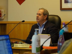 Mayor Andrew Poirier inside of the City Hall Council Chambers during an official meeting. Photo by Bronson Carver