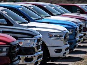New Ram pickup trucks for sale are seen at an auto mall in Ottawa, on April 26, 2021. Justin Tang/The Canadian Press