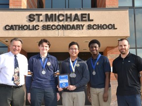 Students at St. Michael Catholic Secondary School in Stratford recently competed at the DECA business competition provincials in Toronto Feb. 12-14. Pictured from left are St. Mike's DECA club staff advisor Steve Eliasziw, Emerson Eickmeier, who finished in the top 20 in the business core category, Marc Paul Campantero, who finished top three in the accounting applications category, Valentine Adeseiye, who finished top 20 in the business finance category, and staff advisor Bryson Filipetti. (Galen Simmons/The Beacon Herald)