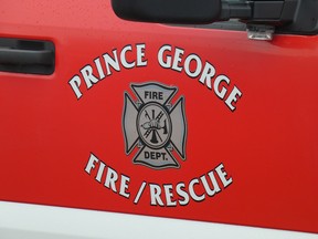 Prince George Fire and Rescue logo on the side of a pick up truck