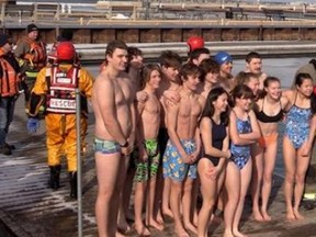 Fifteen members of the Saugeen Shores Lifesaving Club raised funds for equipment during the annual Family Day polar bear dip in Lake Huron on the Port Elgin waterfront Feb. 20. - Facebook