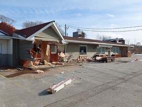 A Saugeen Shores Police Service photo shows significant damage to the front of the Sunny Motel at the south end of Port Elgin on Highway 21. A 47-year-old Owen Sound woman is charged iwith alcohol-releated offences in connection with the Feb. 20 incident. - Saugeen Shores Police Service Facebook
