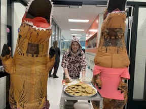 Dinosaurs and cookies helped spread kindness and the message of "Make Bullying Extinct" at Hertiage Hills Elementary for this year's Pink Shirt Day. Lindsay Morey/News Staff