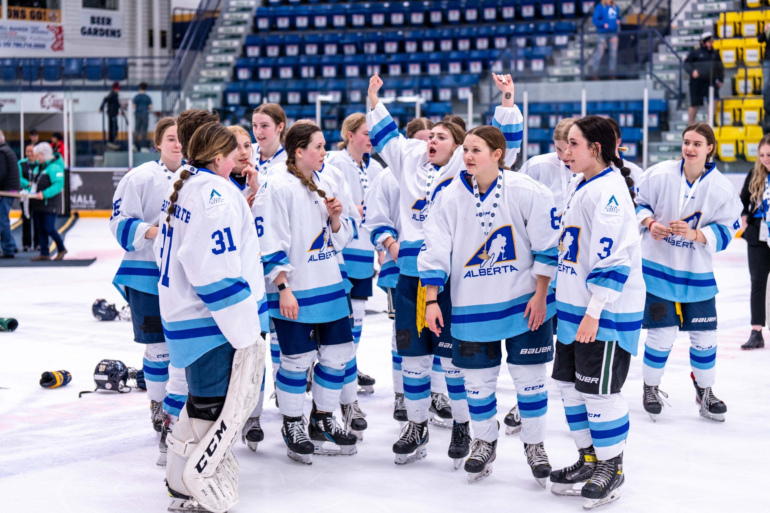 Local members of Alberta's female hockey team shoot for second gold at