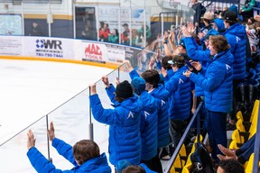 Supporters of Team Alberta North's female hockey team cheer after Alberta won gold against Northwest Territories at Centerfire Place during the Arctic Winter Games on February 3, 2023. Image supplied by the Arctic Winter Games
