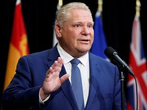 Ontario Premier Doug Ford speaks to media as provincial and territorial premiers gather to discuss health care in Ottawa, February 7, 2023.