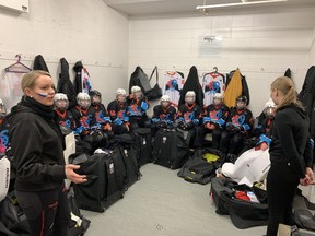 Coach Saana Mantyla, of Kerava, Finland, gives her team of U16 girls a final pep-talk before the gold medal game of their division in this weekend's spring ringette tournament hosted by the Paris Ringette Association.