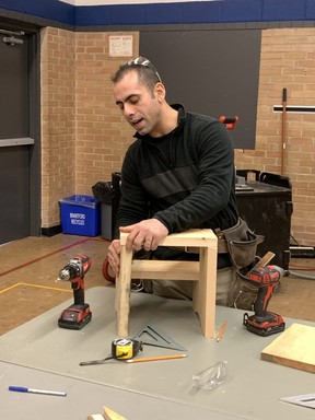 Marco Habib, of Organized Chaos, ran the popular Let's Learn Woodworking class at the Costain/Johnson Community Center Saturday, walking participants through the process of creating a wooden step-stool to take home.
