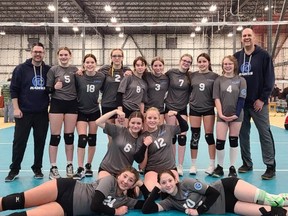 Airdrie's U14 Hawks Blue volleyball team take a celebratory photo following their win at the O'Saxman Volleyball Tournament in Calgary.