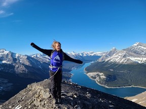 Nicola Wightman is a Regulated Canadian Immigration Consultant running her own Canmore based business called Wild Mountain Immigration. Here she is on Rimwall summit above Spray Lakes.