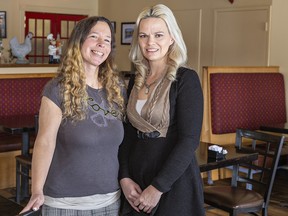 Kim Dammeier (left), co-owner of Scott's Family Restaurant in Paris, Ontario stands with long-time employee Tina Graziano who launched a GoFundMe campaign after Kim's husband and chef Scott was diagnosed with cancer.