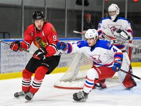 From left, Colin Elliott of Brockville and Nolan Gagnon of Cornwall interact near Colts goalie Dax Easter during the Braves' 4-3 road win on Thursday, Feb. 2.
Robert Lefebvre/Special to the Cornwall Standard-Freeholder/Postmedia Network