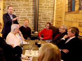Nathaniel Erskine-Smith, left, speaks to Leeds-Grenville-Thousand Islands and Rideau Lakes provincial Liberals at the 1000 Islands Brewing Company on Thursday evening. Seated to his right is Josh Bennett, the most recent provincial candidate for the riding. (RONALD ZAJAC/The Recorder and Times)