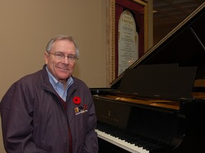 Don McGowan sits at the newly restored Steinway piano in the lobby of the newly renovated Brockville Arts Centre in November, 2009. (FILE PHOTO)