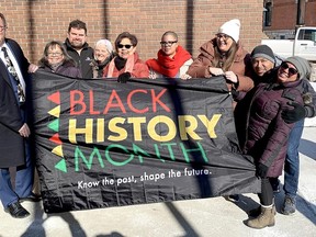 Black history month began Feb.  1 with a flag-raising at the Chatham-Kent Civic Centre.  From left are Mayor Darrin Canniff, Shannon Prince, curator of the Buxton National Historic Site and Museum, Coun.  Anthony Ceccacci, Coun.  Marjorie Crew, Jackie Bernard and Whitney Belovicz with the Josiah Henson Museum of African-Canadian History, Samantha Meredith, curator of the Chatham-Kent Black Historical Society, Steven Cook, curator of the Josiah Henson museum, and Michelle Robbins, assistant curator of the Buxton museum.  Ellwood Shreve/Postmedia