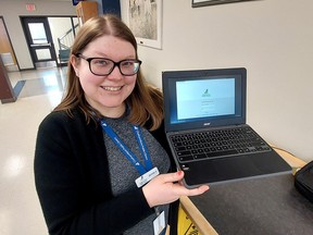 Collection librarian Jessica Foott displays one of the Chromebook laptop computers that are available to be loaned out at all 11 branches of the Chatham-Kent Public Library. (Ellwood Shreve/Chatham Daily News)