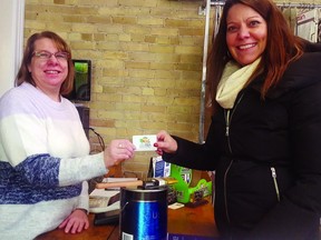 The recently launched Central Huron gift card program so far involves more than 70 participating businesses. Pictured are Interior Trends owner Jen Harwood-Jones, left, and Central Huron community improvement co-ordinator Angela Smith. Handout