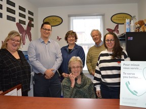 Celebrating a new phone system at the Children's Treatment Centre. Front row seated is CTC volunteer receptionist Mary Lalonde. Back row standing, from left to right: Desjardins regional advisor, community partnerships and programs Martine Levesque; manager member services, eastern Ontario Mathieu Maritha; CTC administrative assistant Robine Sabourin; CTC executive director Robert Smith; and member, board of directors, Desjardins Valerie Doré . Pictured on Friday February 10, 2023 in Cornwall, Ont. Shawna O'Neill/Cornwall Standard-Freeholder/Postmedia Network