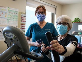 Handout/Cornwall Standard-Freeholder/Postmedia Network
A Cornwall Community Hospital photo of registered respiratory therapist Sylvie Belanger (left) with Pamela Taylor (right) during a pulmonary and heart function rehabilitation session in February 2023.