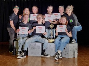 Holy Cross Catholic Secondary School's "Green Beans" improv team, seen holding their newly won gold medal certificates from the Canadian Improv Games in Kingston, Feb. 2-4, 2023. Front row, from left: Samara, Ethan and Quinn. Back row, from left: co-coach Amy Wilding, Edithe, Claire, Annabelle, Maddy and co-coach Stacy Check-Drumm.
