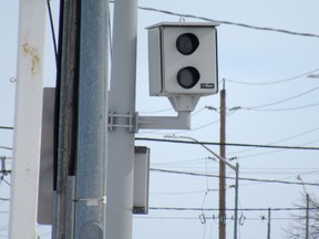 The red light camera at Centennial Drive and Princess Street on Monday.