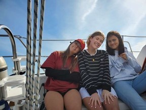 From left to right, Chloe, Hannah and Gabriela on a boating trip.    SUPPLIED