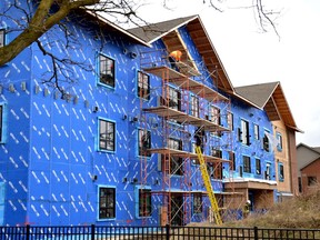 In an update presented to Stratford's social services subcommittee, staff said the 27 apartments in the city's second Britannia Street affordable housing building will be ready for a staggered move-in by June.  Pictured, workers continue masonry and drywall work on the building Wednesday morning.  Galen Simmons/The Beacon Herald/Postmedia Network
