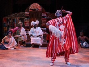 Anthony Santiago (foreground) as Elesin with Ijeoma Emesowum (left) as Ariyike, Celia Aloma as Olabisi, Akosua Amo-Adem as Iyaloja, and Espoir Segbeaya as Wuraola in Death and the King's Horseman.  Stratford Festival 2022. Photo by David Hou.