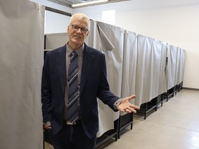 George Esser, pastor of River City Vineyard in Sarnia, shows expanded space in the church's shelter during an open house Saturday.