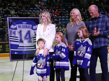 Former Sudbury Wolves great Marc Staal, along with his wife, Lindsay, and their kids, Jack, Emily and Anna, and his parents, Henry and Linda, take part in Wolves pre-game ceremony at the Sudbury Community Arena in Sudbury, Ont. on Friday February 3, 2023. StaalÕs number was raised to the rafters during the ceremony. John Lappa/Sudbury Star/Postmedia Network