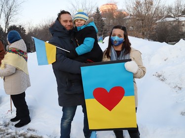Kai and Lacey Santala, and their son Fynnley, 6, participated in a candlelight vigil to Stand with Ukraine, 365 Days of Resistance, in Sudbury, Ont. on Friday February 24, 2023.