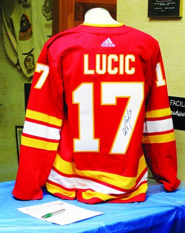 A jersey signed by Calgary Flame Milan Lucic was among the silent auction items up for grabs during Bisons Day on Feb. 4. The winning bid for the Lucic jersey, which was set out just outside the Vulcan Curliing Club's lounge, ended up being $335. STEPHEN TIPPER