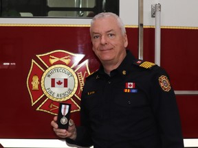 Fire Chief Brian Wynn received the Platinum Jubilee Medal in recognition of his contributions at the Whitecourt firehall and Eastlink Park.