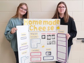 Tessa Leroux and Haven Ley, in the Grade 7 French Immersion Program at Lasalle Secondary School, prepare for the Rainbow District School Board Elementary Science Fair on March 7.