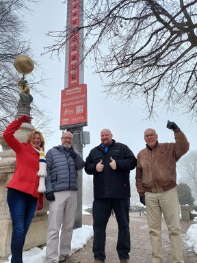 Elizabeth Cooper from United Way Perth-Huron (left), Tim Veal and Jason Partridge of Ideal Supply, and Bruce Duncan Skeaff, president of the Stratford Pride Community Centre, celebrate a milestone reached in this year's fundraising campaign.  (Contributed photo)