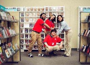 Cast members from the film I Like Movies, from left, Andy McQueen (Brendan), Alex Ateah (Shannon), Isaiah Lehtinen (Lawrence) and Romina D’Ugo (Alana) on set. Props like shelving and racks from the abandoned Blockbuster on the Sunset Strip were used to create their own early 2000s-era video store called Sequels. (Photo courtesy of VHS Forever Inc.)